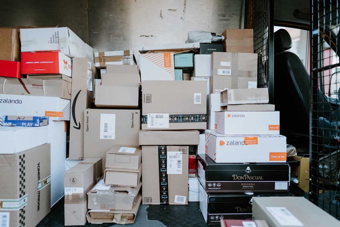 Packages being prepared for delivery at a shipping facility